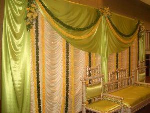 Green and white mehndi stage | Simplicity events | Asian Weddings