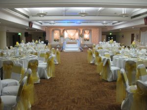 Gold and white Asian wedding decor at Old Trafford | Simplicity events | Asian Weddings