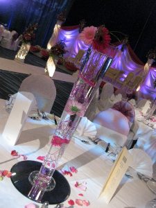 Tall glass vase centerpiece with pink gerberas | Simplicity events | Asian Weddings