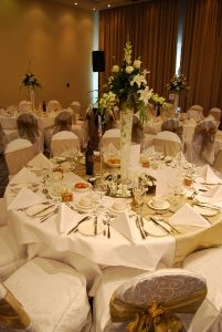 White and gold table decor with tall centerpiece | Simplicity events | Asian Weddings