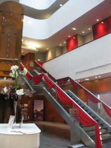Staircase with red draping | Simplicity events | Asian Weddings