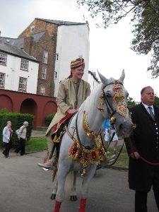 Groom arriving on horseback | Simplicity events | Asian Weddings