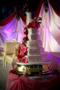 5 tiered wedding cake with pink gerberas | Simplicity events | Asian Weddings