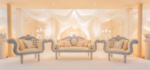 Romantic themed Asian wedding stage with white draping and pearls | Simplicity events | Asian Weddings