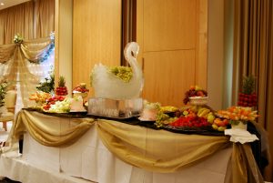 Swan ice sculpture and fruit display | Simplicity events | Asian Weddings