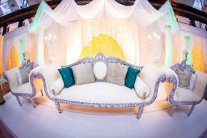Romantic themed Asian wedding stage with white draping and pearls at Devonshire Dome | Simplicity events | Asian Weddings