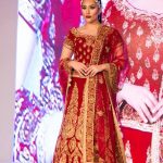 Asian Wedding Experience Catwalk | bride in red and gold lengha